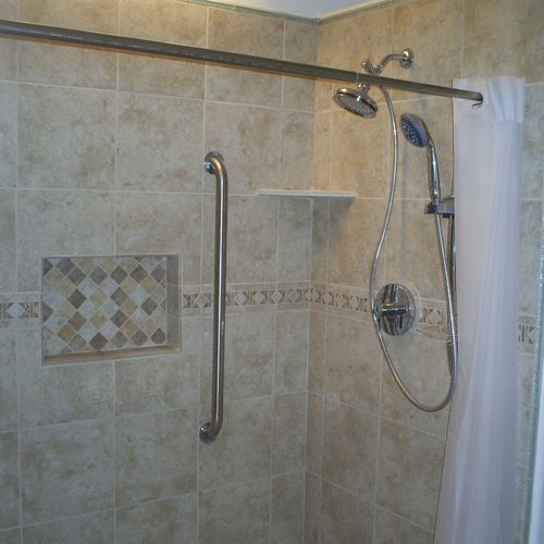 Installed shower tile and fixtures