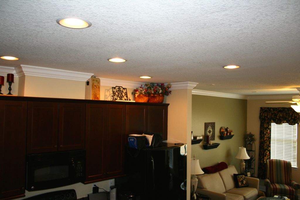 Crown molding install in foyer, dining, kitchen, a