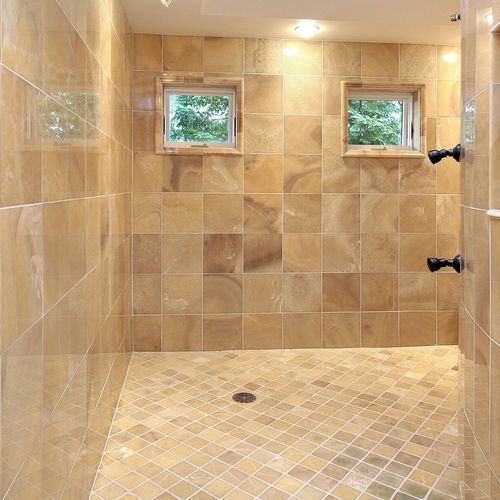 This big shower is tiled with highly polished 12"m