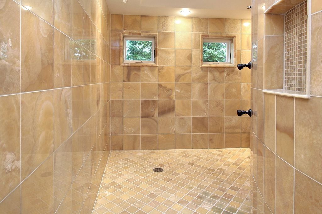 This big shower is tiled with highly polished 12"m