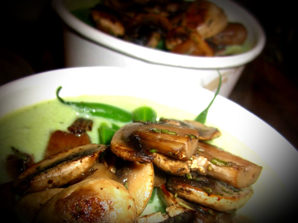 Green bean soup with sauteed crimini mushrooms.