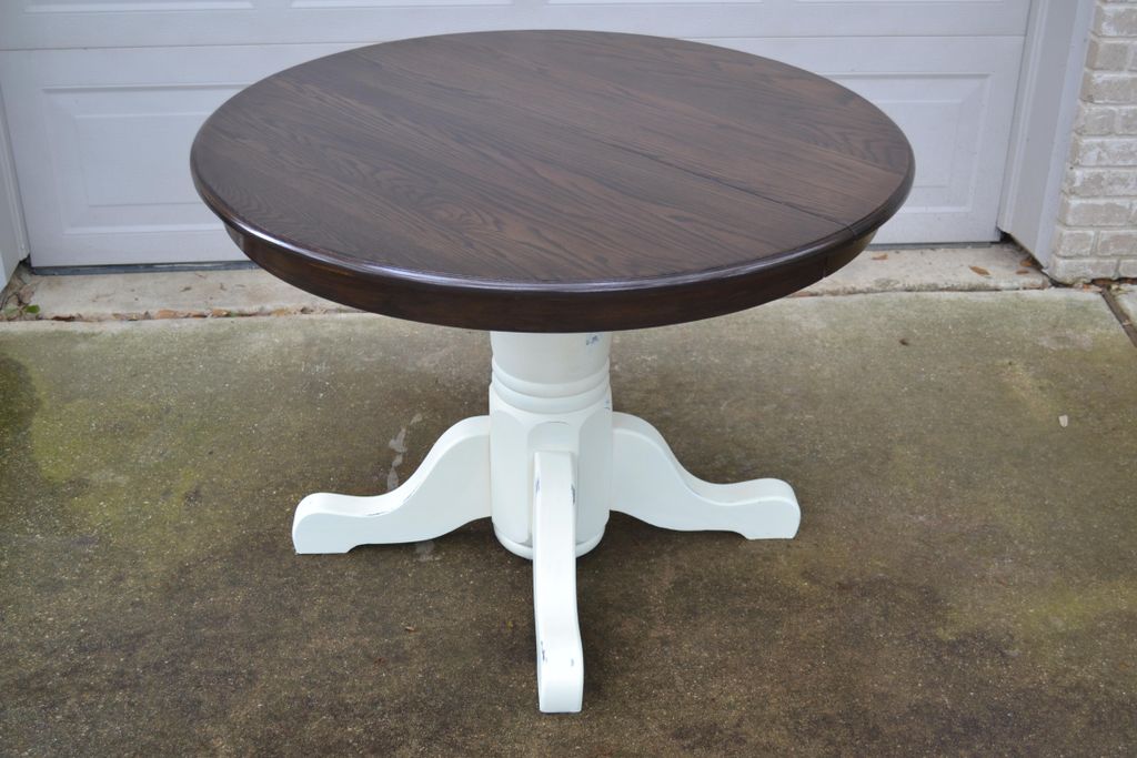 The golden oak table with the to refinished with a