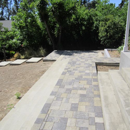 Exterior concrete steps (sand finish) with pavers.