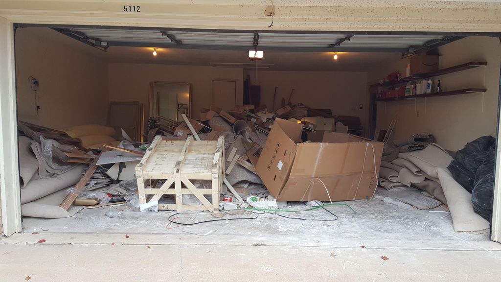 Before.  Garage clean out of home remodeling debri