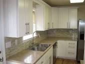 Remove and replace cabinets and new granite