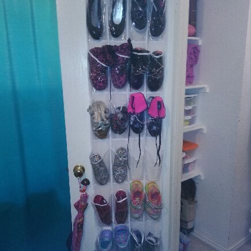 Shoes hung on door instead of taking up space in t