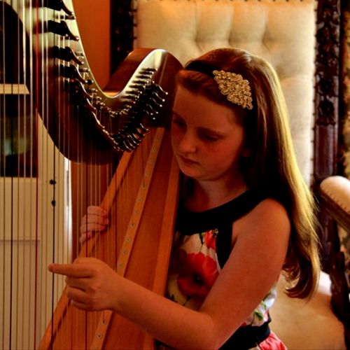One of my harp students performing in a recital.