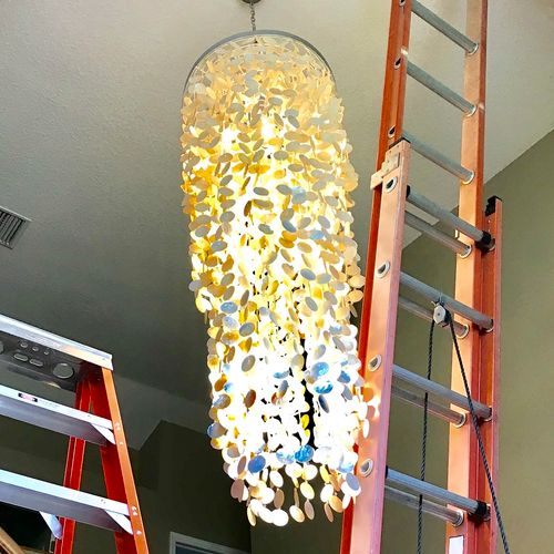 Chandelier installation/replacement hung by two of