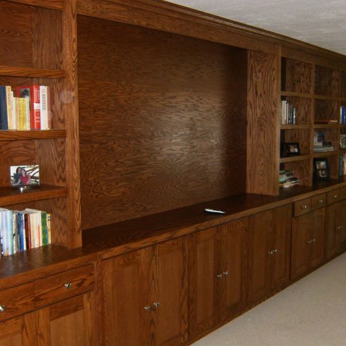 24' by 8' oak entertainment center and bookcases. 