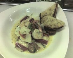 Lobster Ravioli in a white wine,lemon buerre blanc