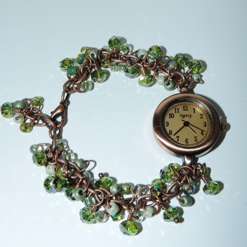This watch is made of shades of green 6/0 glass se