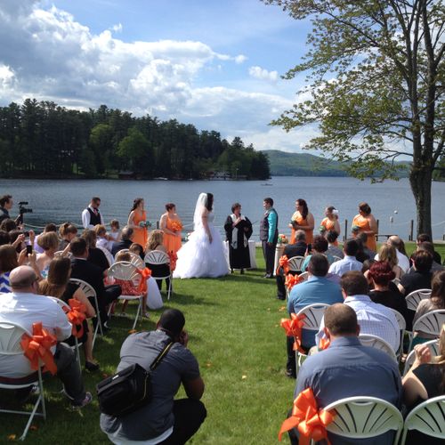 Lakeside ceremony. Same sex weddings are not a pro