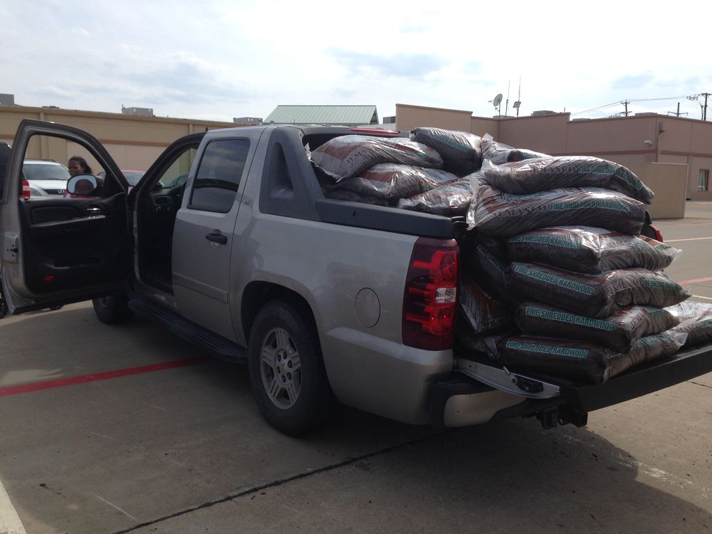 Partial load of mulch ready to spread at job site 