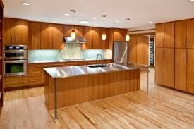 Contemporary styled kitchen with hardwood floors. 