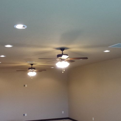 Recessed cans and ceiling fans in game room