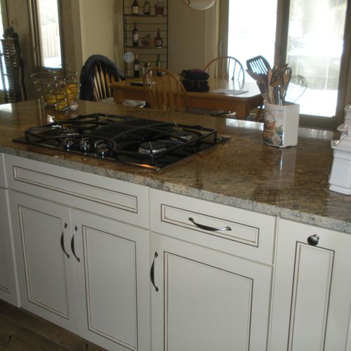 Painted maple cabinets with granite counters
