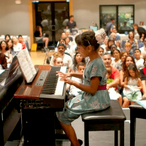 Students performing at the annual FAME recital.