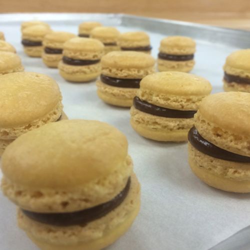 French macaroons with passion fruit ganache