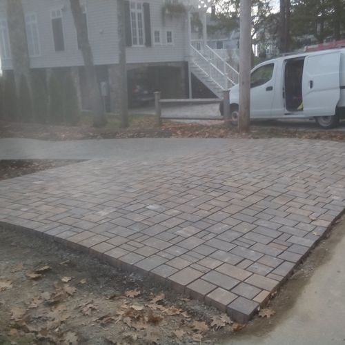 Permeable pavers installed for drainage at beginni