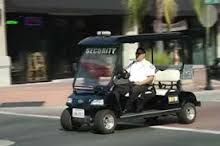 Liege Security Officer on Golf Cart Patrol in a So