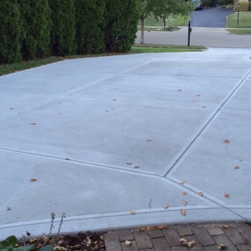 Simple resufacing of concrete driveway.