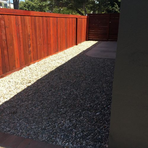  After Fence installation /stain and rocks install