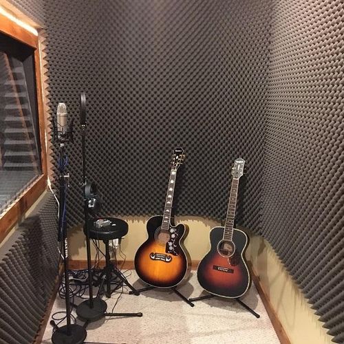 Vocal booth.  Rode NT1 microphone.  Epiphone jumbo