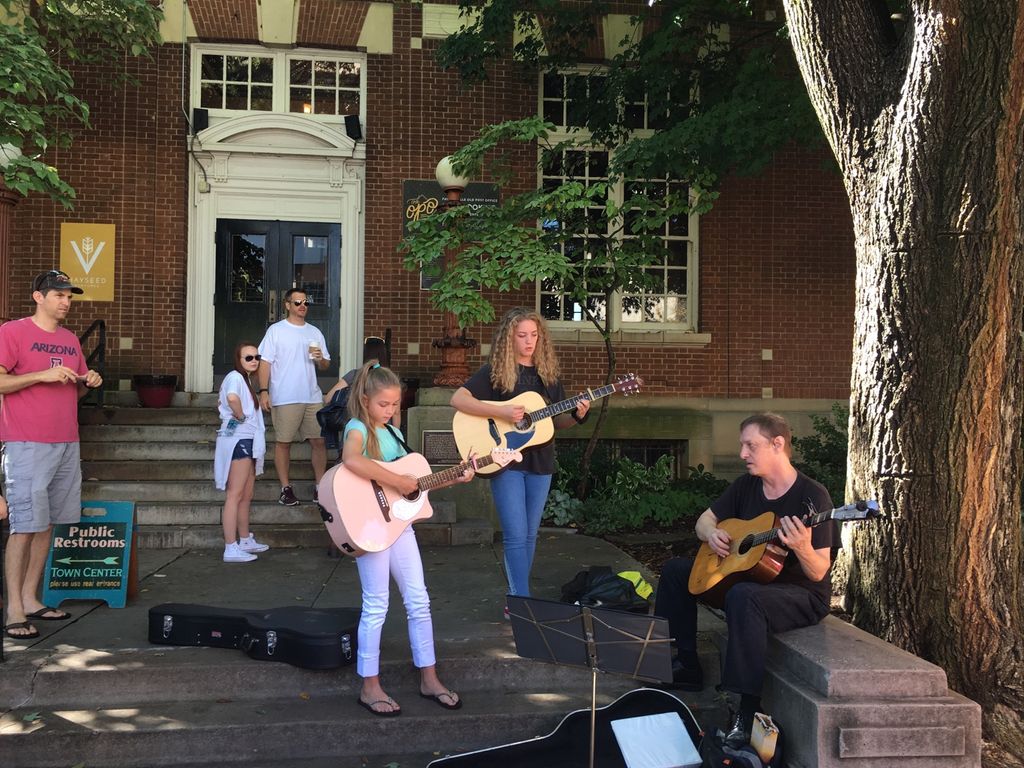 With students at the farmers market summer 2016.