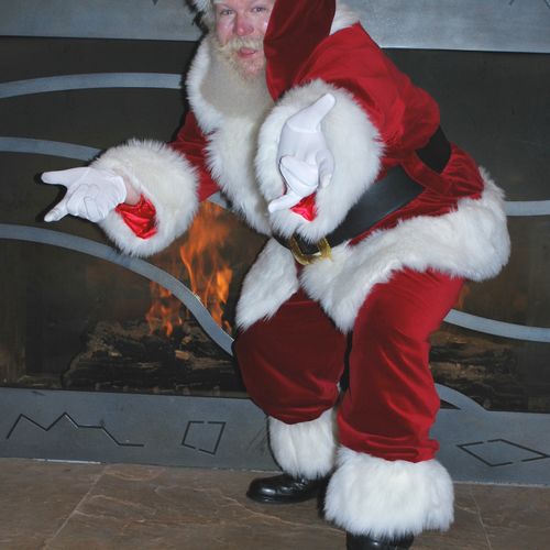 Santa Arriving via your chimney to perform his int