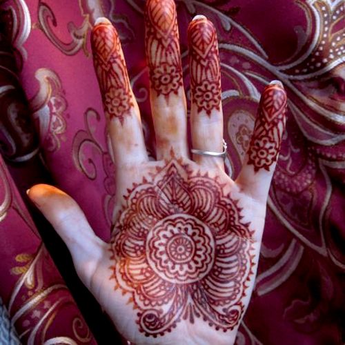 Traditional henna on the hand