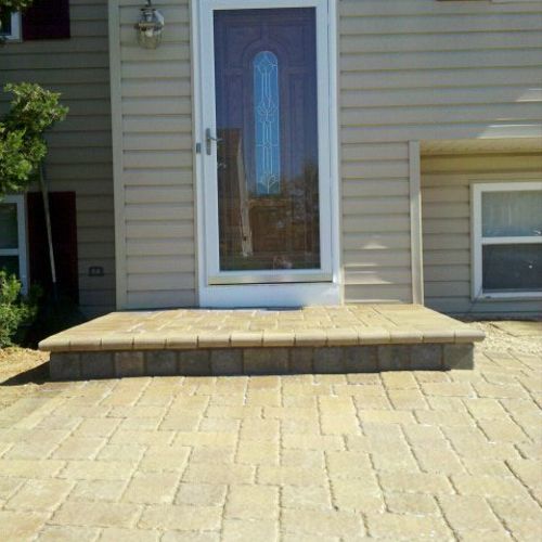 Landscape- enlarge front step, install paver walkw