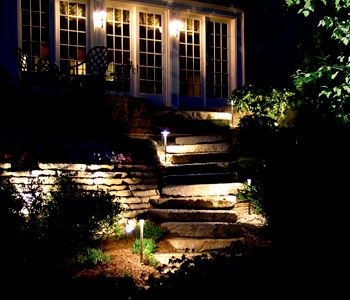 Outdoor landscape lighting to highlight pathways &