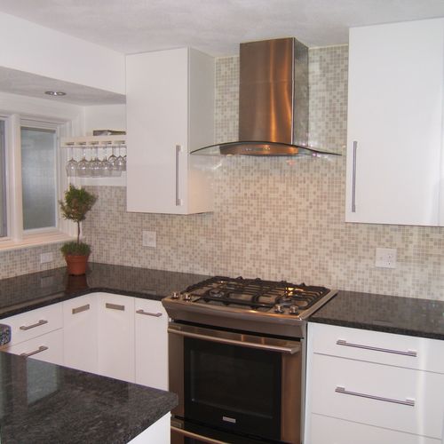 Modern kitchen with glass tile backsplash!