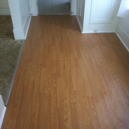 A laminate Hardwood floor installed in a entry way