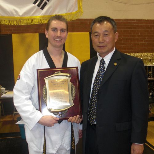 Mr Wolters Receiving Taekwondo Award From Grand Ma