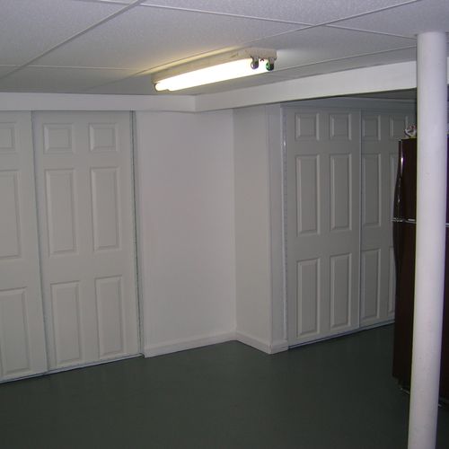 After - New sheetrock, ceiling, closet doors, pain