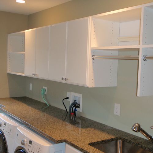 Custom overhead cabinets and hanging for delicates
