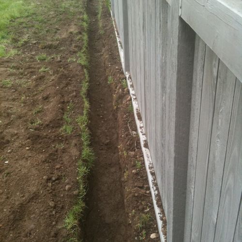 Installed french drain on property to fix run-off 