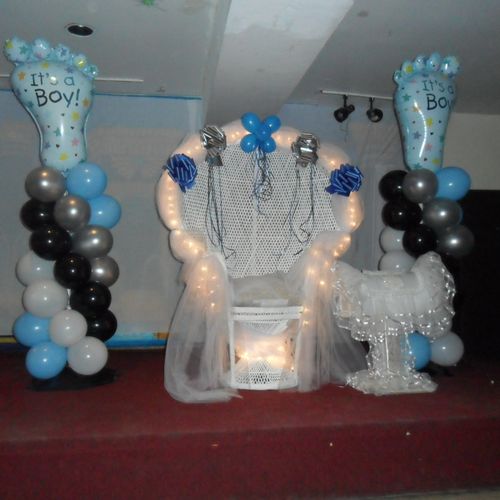 Chair Rentals with Balloon Pillars and a topping o