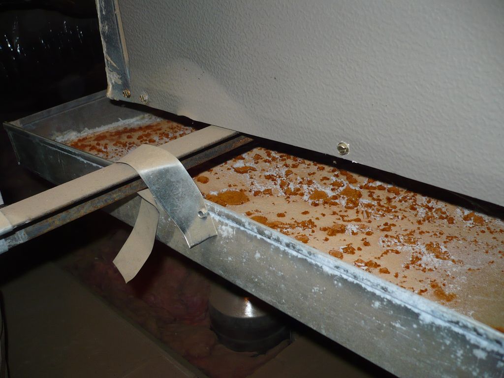 Corroded secondary condensate pan in attic for air