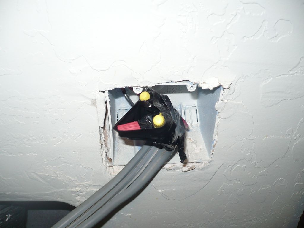 Improper electrical connection in laundry room.
