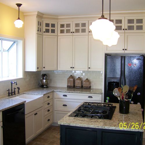 Custom Kitchen Cabinets with Tile Flooring and Bac