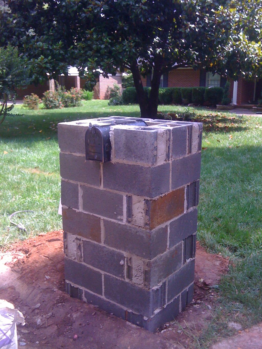 Stone work before pic of mail box