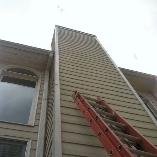 50 foot siding replacement on chimney. Nothing too