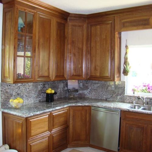 Custom made and installed Walnut cabinets