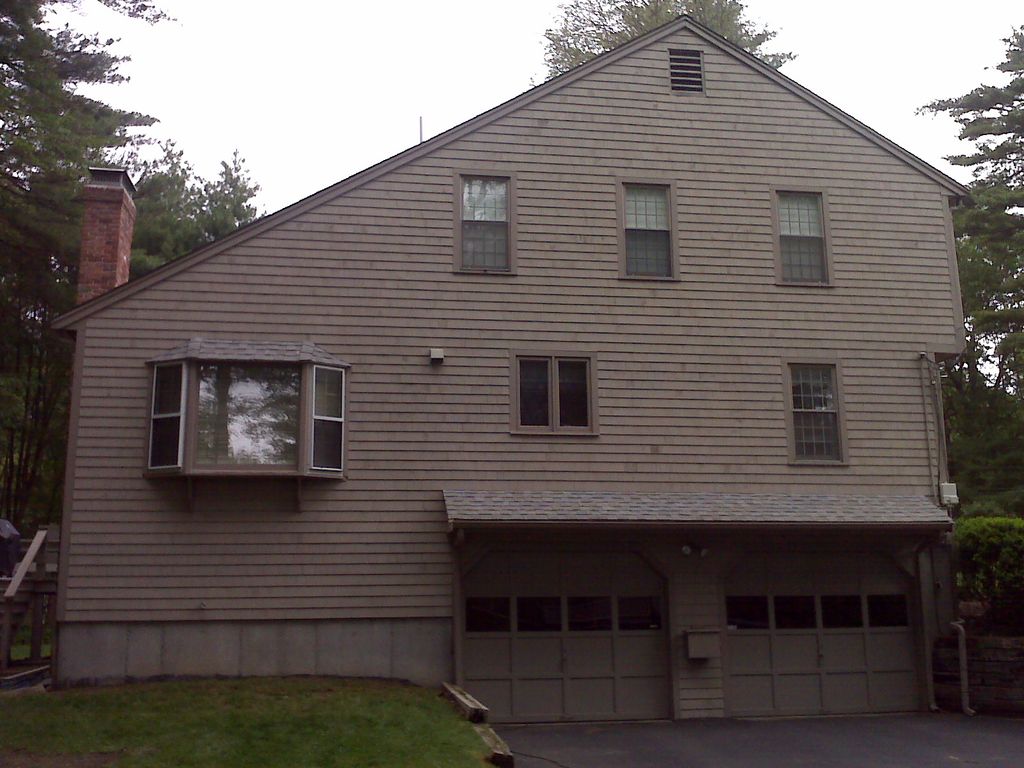 Pre-dipped white cedar shingles in Hingham