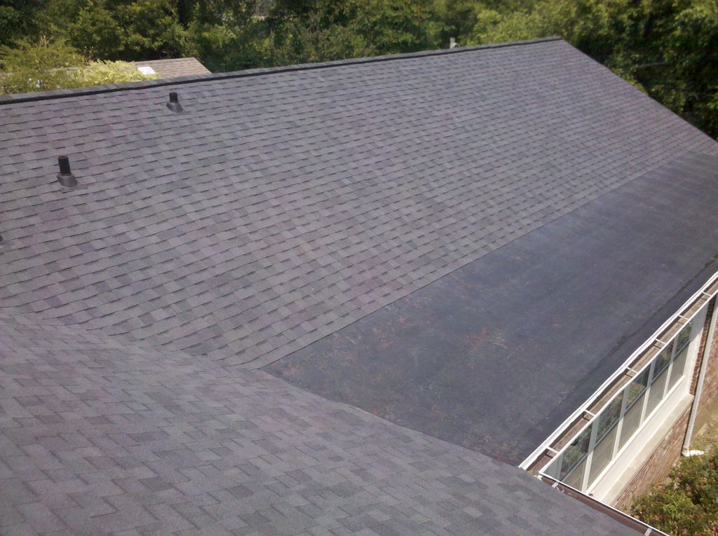 Rubber Roof on Addition with Shingles on Standard 