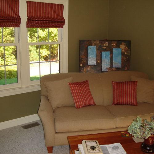 Custom roman shades and pillows. Recommended wall 