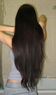 Micro-weft extensions on thick wavy hair.