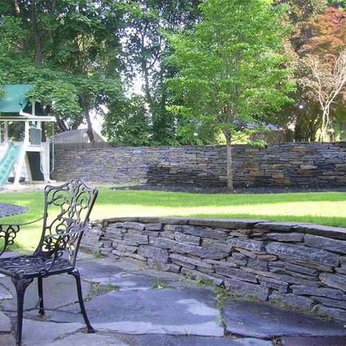 Stone patio, retaining walls